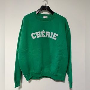 In the Style x Lorna Luce collab sweater “Cherie” in size XL.